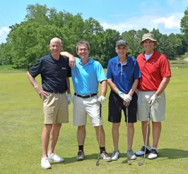 men at ymca camp lakewood and trout lodge golf tournament