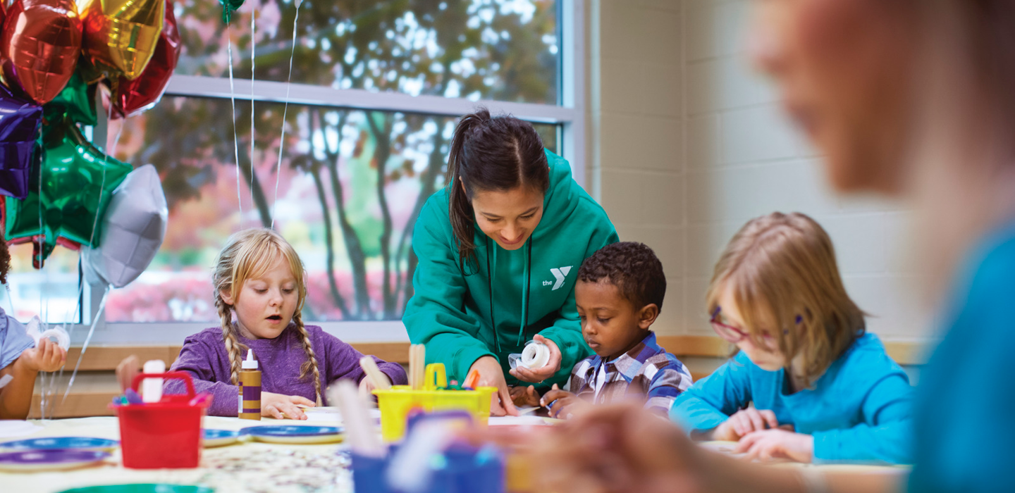 Children are having fun at a friend's birthday party hosted at the YMCA