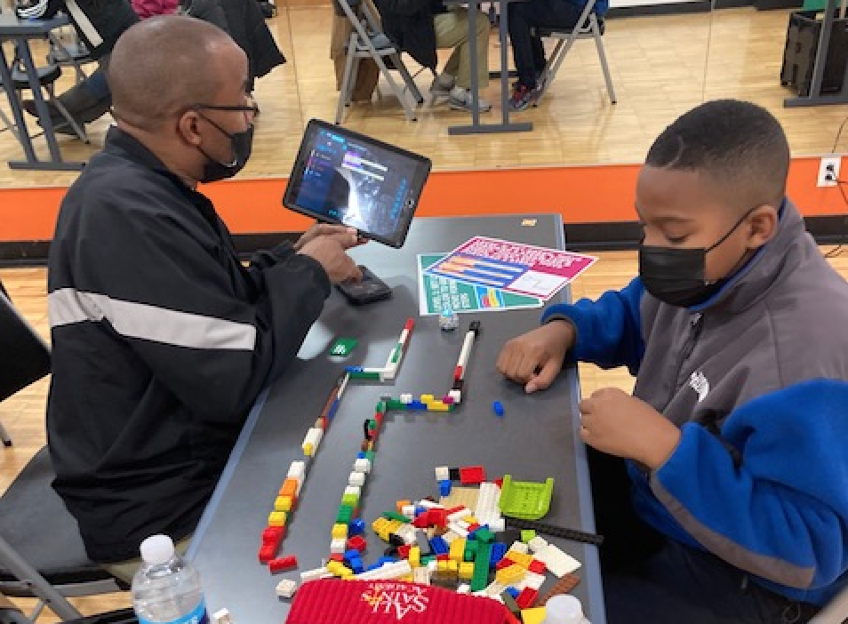 father and son at steam family night