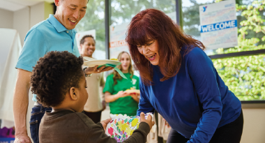 a family having fun at a ymca family community event