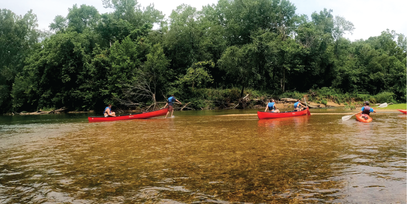 LIT campers participating in a canoe trip