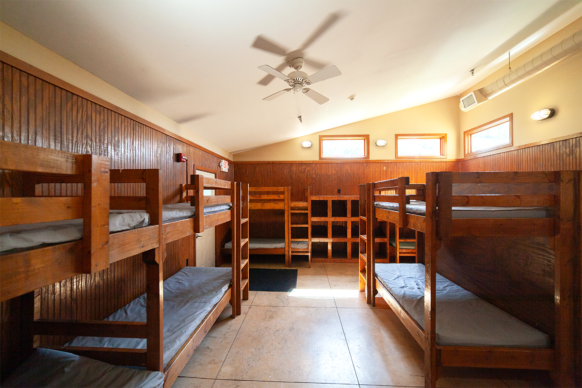 Bunk bed sleeping area inside a Main Camp cabin