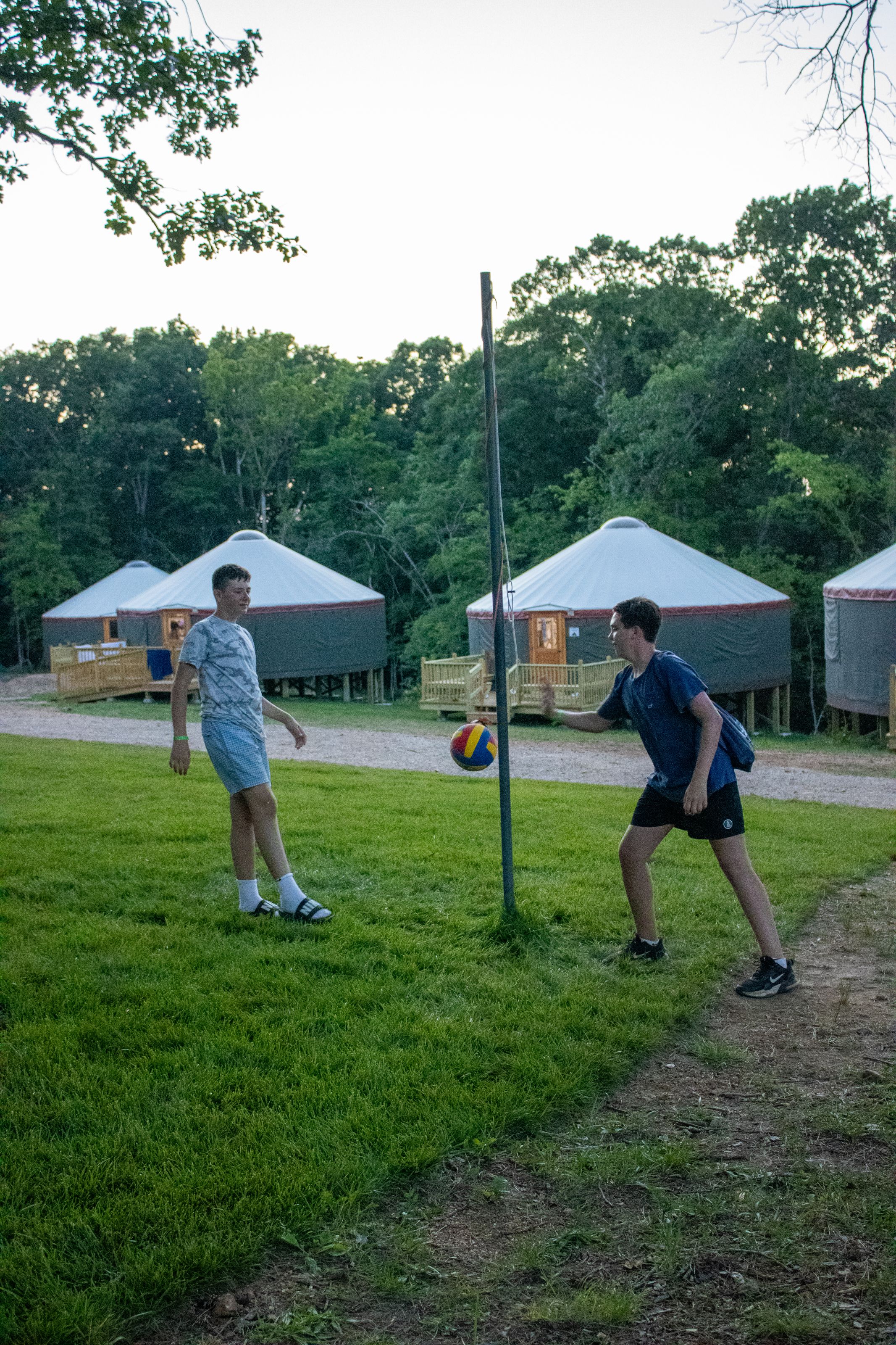 Campers enjoying activities near East Camp yurts