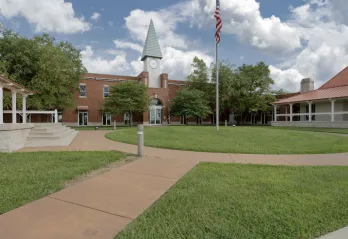 Ste Genevieve County YMCA Community Center Building Exterior photo with courtyard walkway