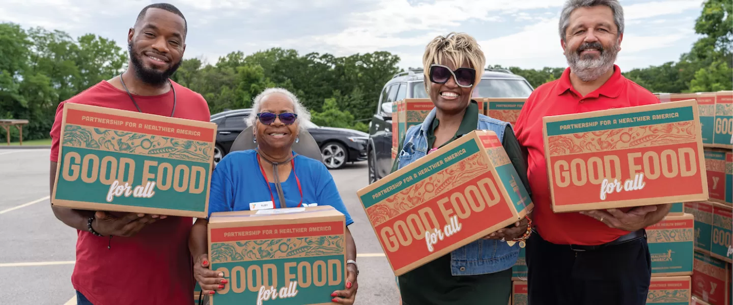 YMCA Food For All Partnership for a Healthier America Volunteers Handing Out Boxes of Fresh Food