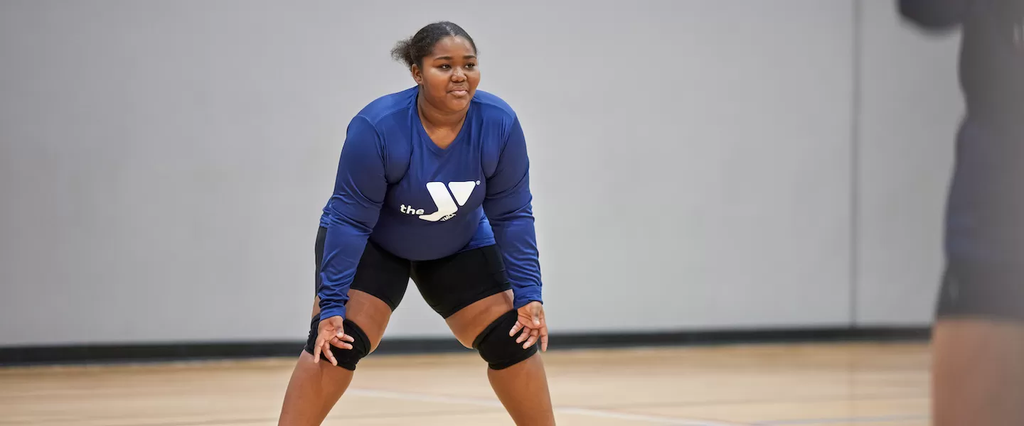YMCA Youth Volleyball Participant Ready to Rally at a Volleyball Game