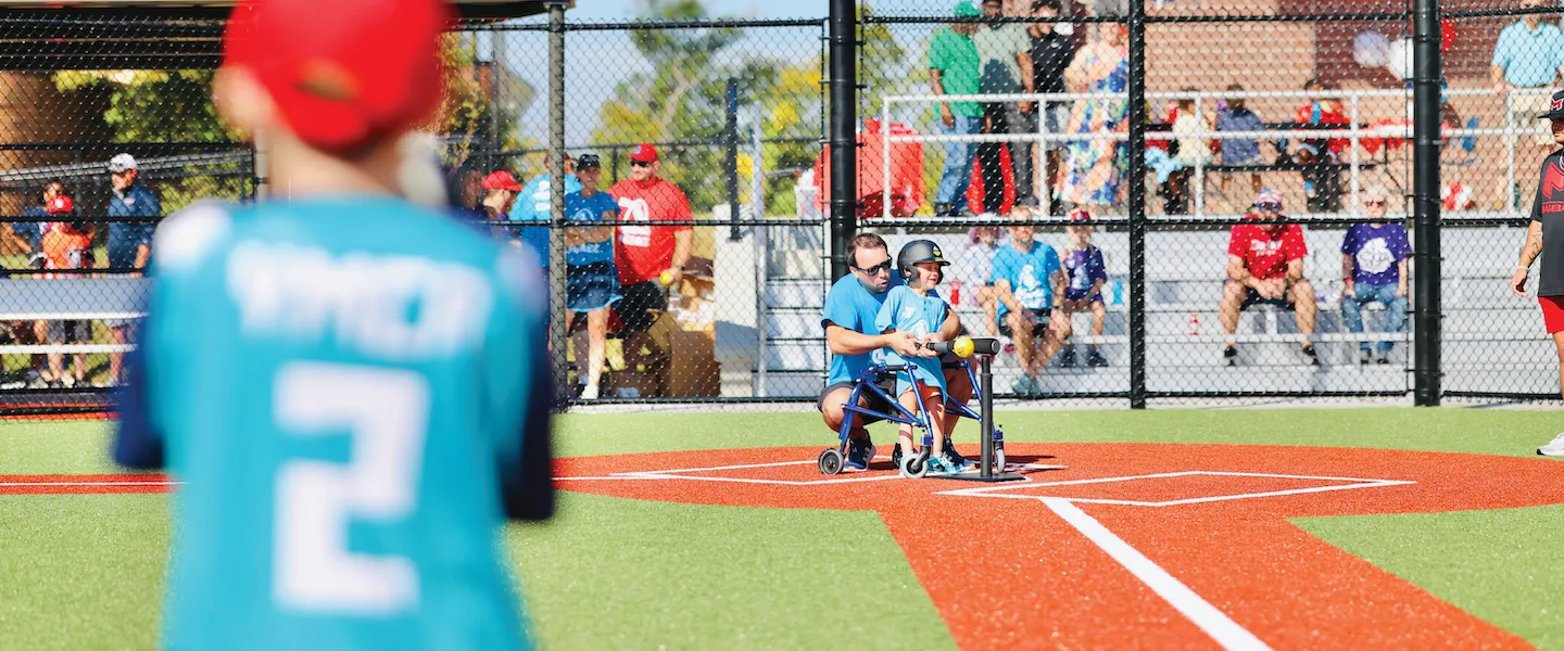 ymca adaptive baseball participant