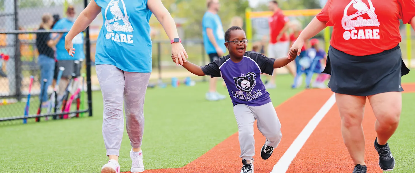 ymca adaptive baseball participant