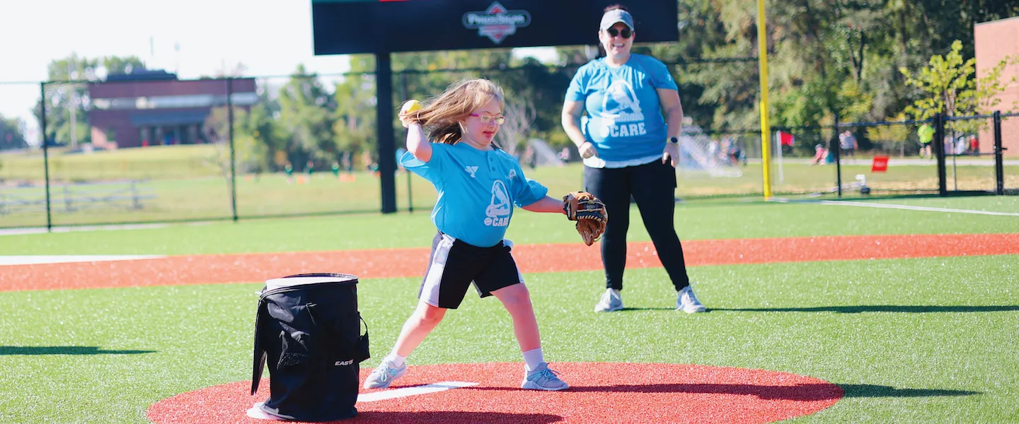 ymca adaptive baseball participant