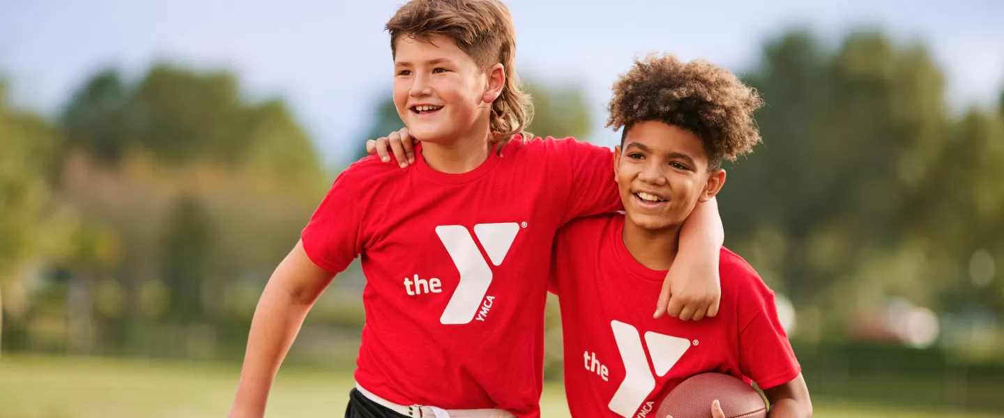YMCA Youth Flag Football League Friends and Players Smiling at Practice
