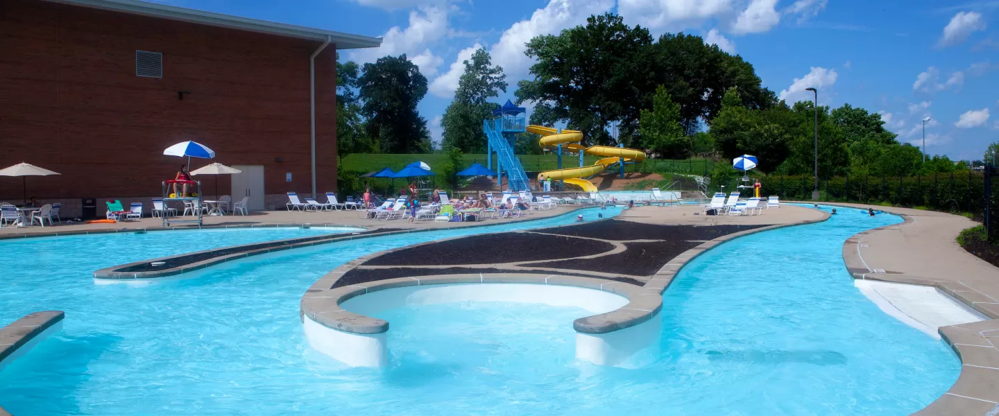 Carondelet Park Rec Complex Gym St. Louis, MO Outdoor Aquatic Center featuring a lazy river and water vortex