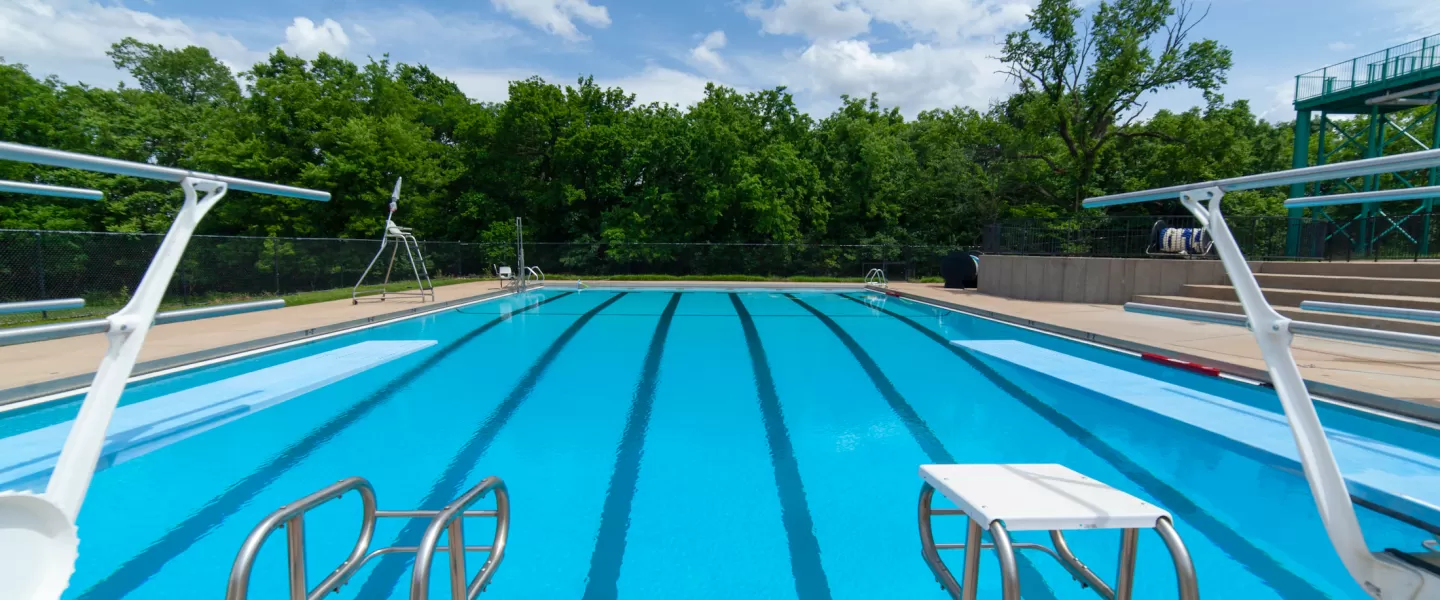 RiverChase YMCA Gym Fenton, MO Outdoor Aquatic Center Outdoor Lap Pool with Lap Lanes, Diving Boards, and Diving Blocks