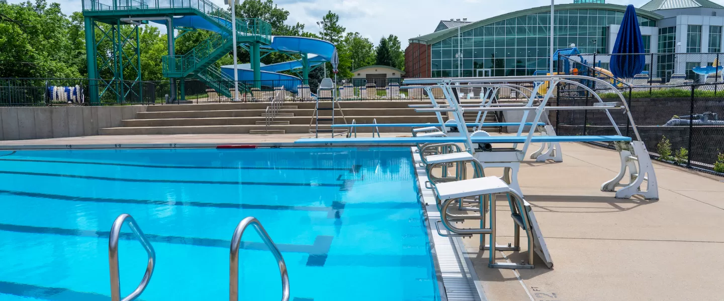 RiverChase YMCA Gym Fenton, MO Outdoor Aquatic Center Lap and Fitness Swimming Pool with Lap Lanes, Diving Boards, and Diving Blocks