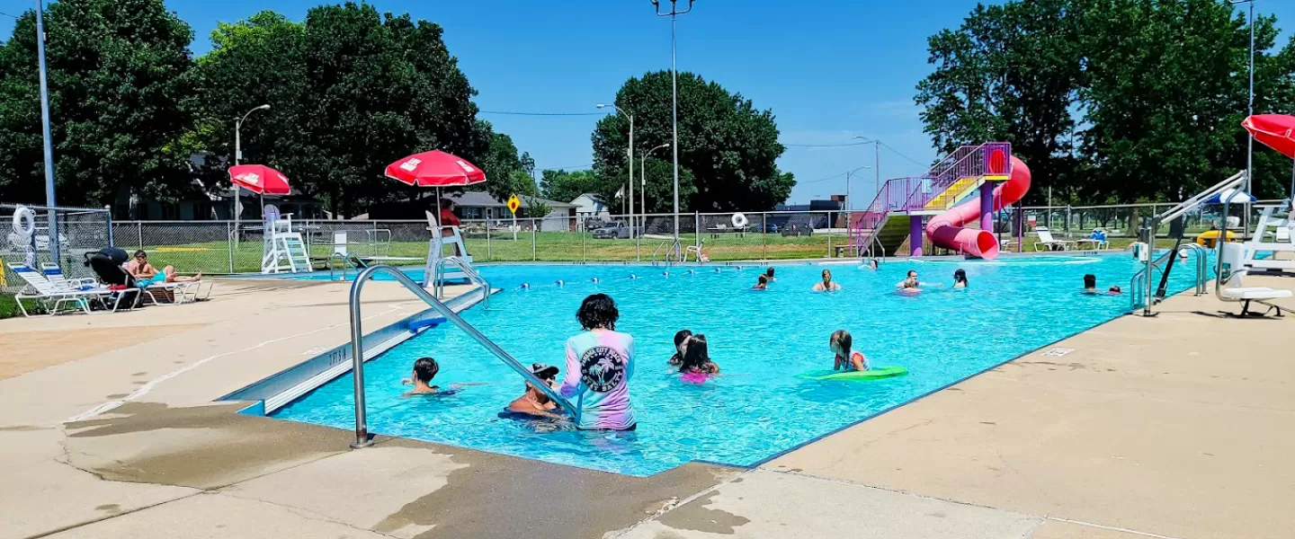 New Baden Legion Memorial Outdoor Swimming Pool in New Baden, IL showing Swimmers in the Summer