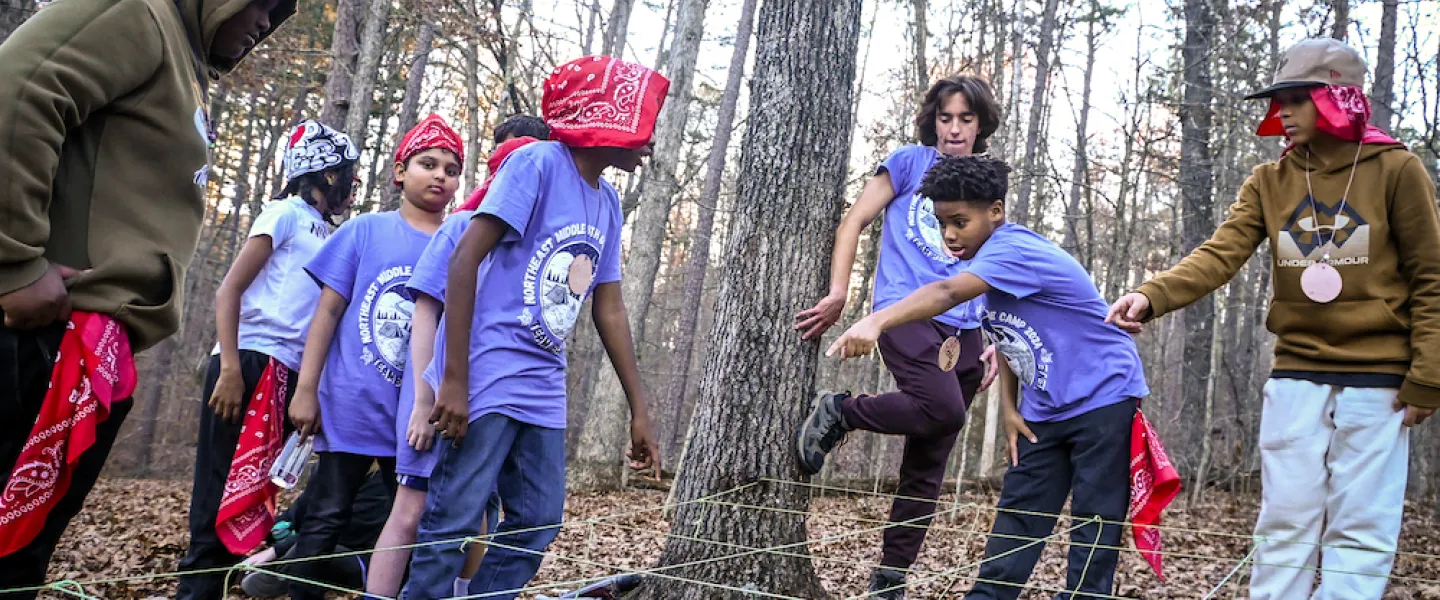 Outdoor Education school group from St. Louis doing a team building activity at YMCA Trout Lodge