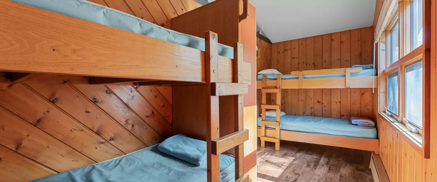 Second bunk room in Bluff View Cabin with twin-over-twin bunks, ideal for larger group stays