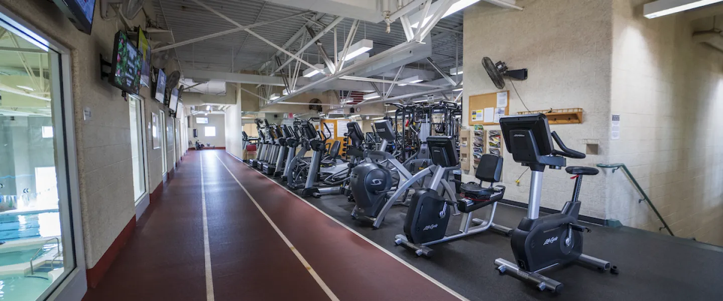 Ste. Genevieve County YMCA Fitness Center with Cardio Equipment like Recumbent Bikes and Indoor Walking and Running Track