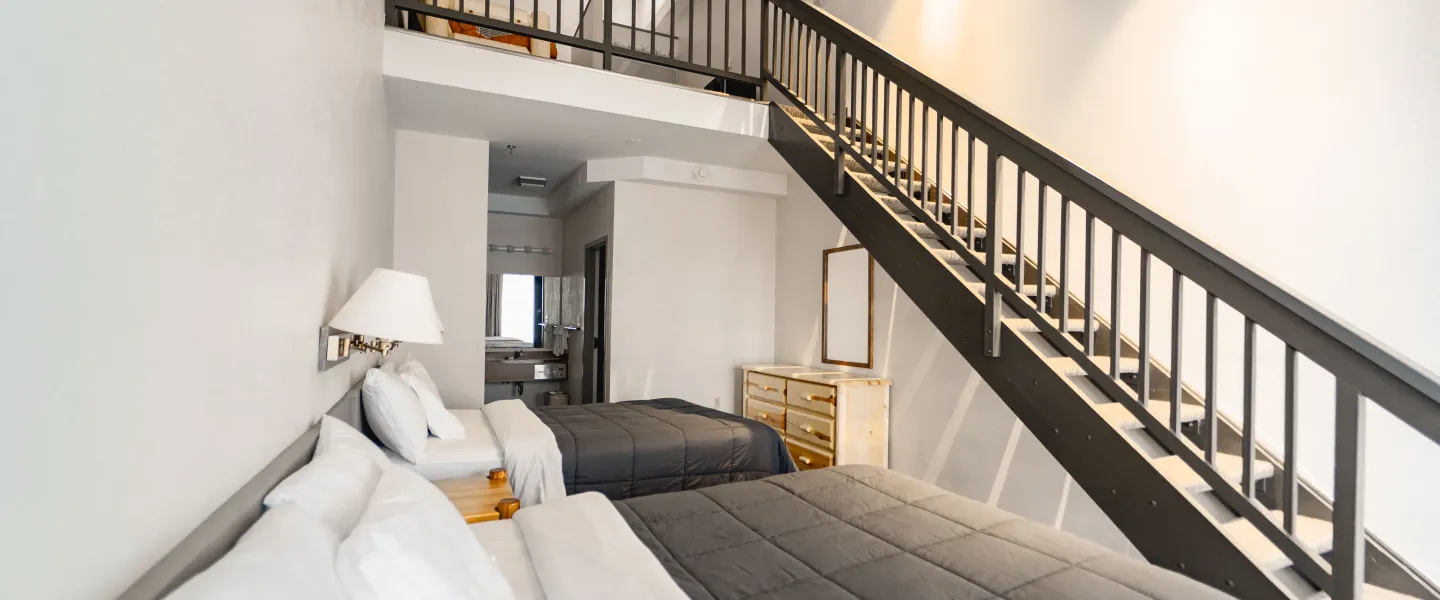 A corner view inside of a Loft Room inside the Main Trout Lodge guest building.