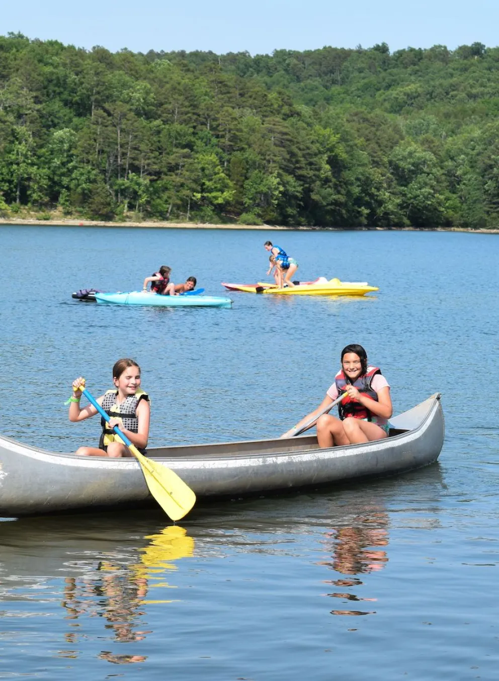 ymca camp lakewood girls in canoe on sunnen lake