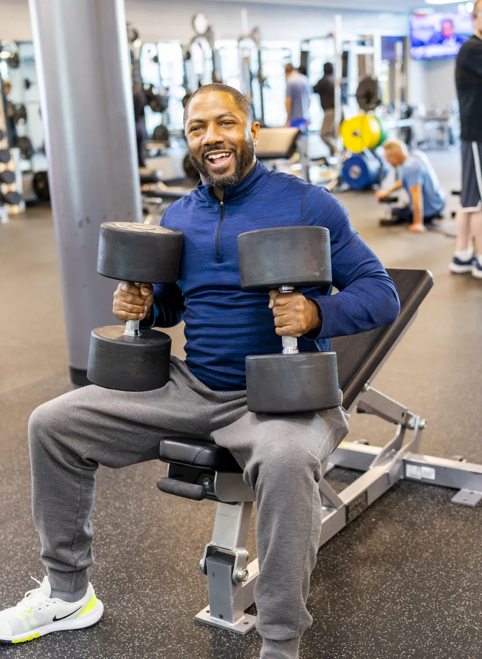 ymca fitness workout man with weights new