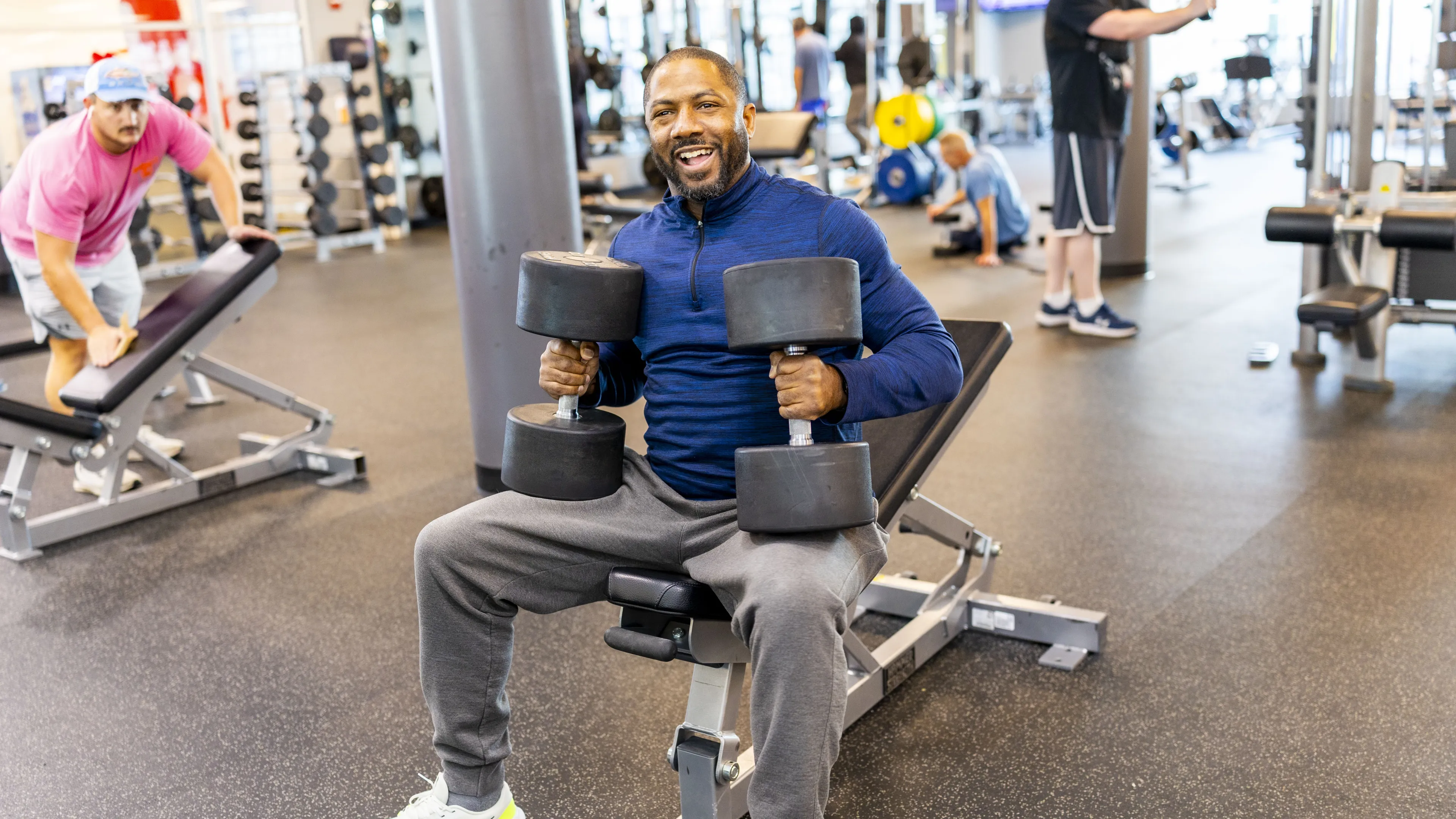 ymca fitness workout man with weights new