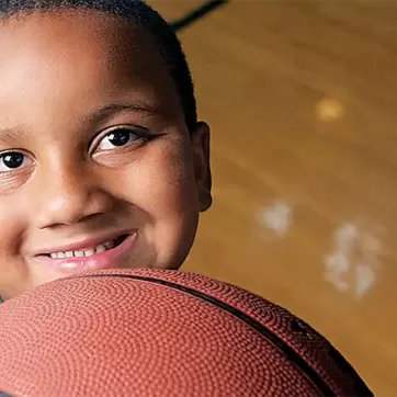 boy holding a basketball