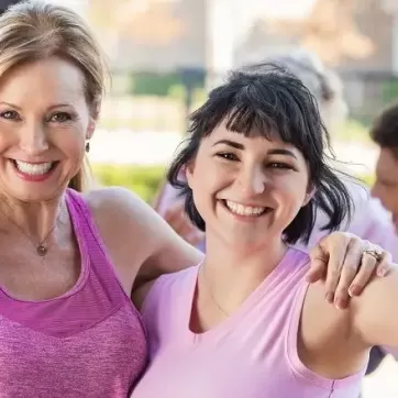 women flexing their muscles