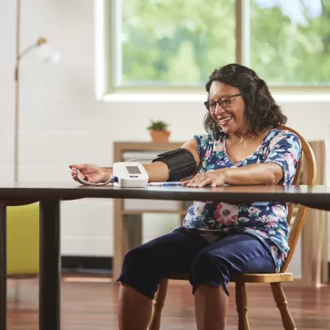 woman taking her blood pressure