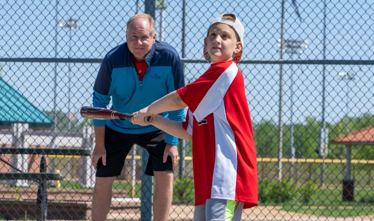 kid playing baseball - adaptive sports