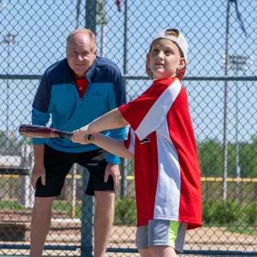 kid playing baseball - adaptive sports