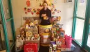 Thumbnail: a Y employee helping with food drive