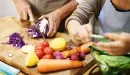 Thumbnail: people cutting vegetables on a cutting board