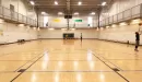 Thumbnail: Gymnasium with 6 basketball hoops. Indoor track overhead.