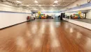 Thumbnail: Group exercise room with mirrors on one side. Large, rectangular room with non-slip flooring