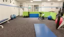 Thumbnail: Separate stretching and training area with open floor space.