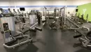 Thumbnail: Weights area with bars, machines, free weights, and benches.
