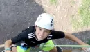 Thumbnail: photo looking down on young boy starting to climb