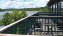 Thumbnail: a view of the lake from a guest room balcony