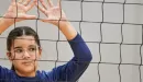 Thumbnail: ymca youth volleyball participant setting a volleyball
