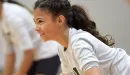 Thumbnail: ymca youth volleyball participant getting ready to retrieve a serve 
