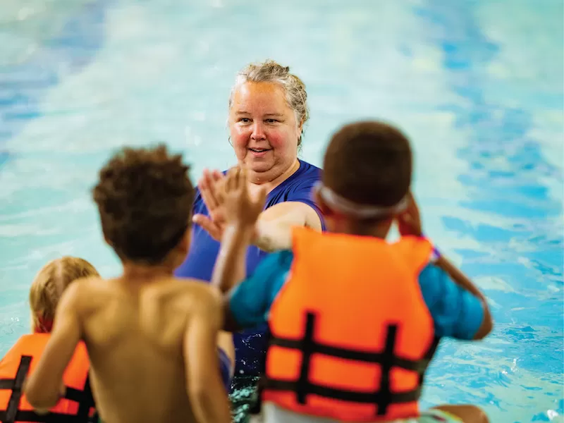 YMCA summer camp children in a water safety class