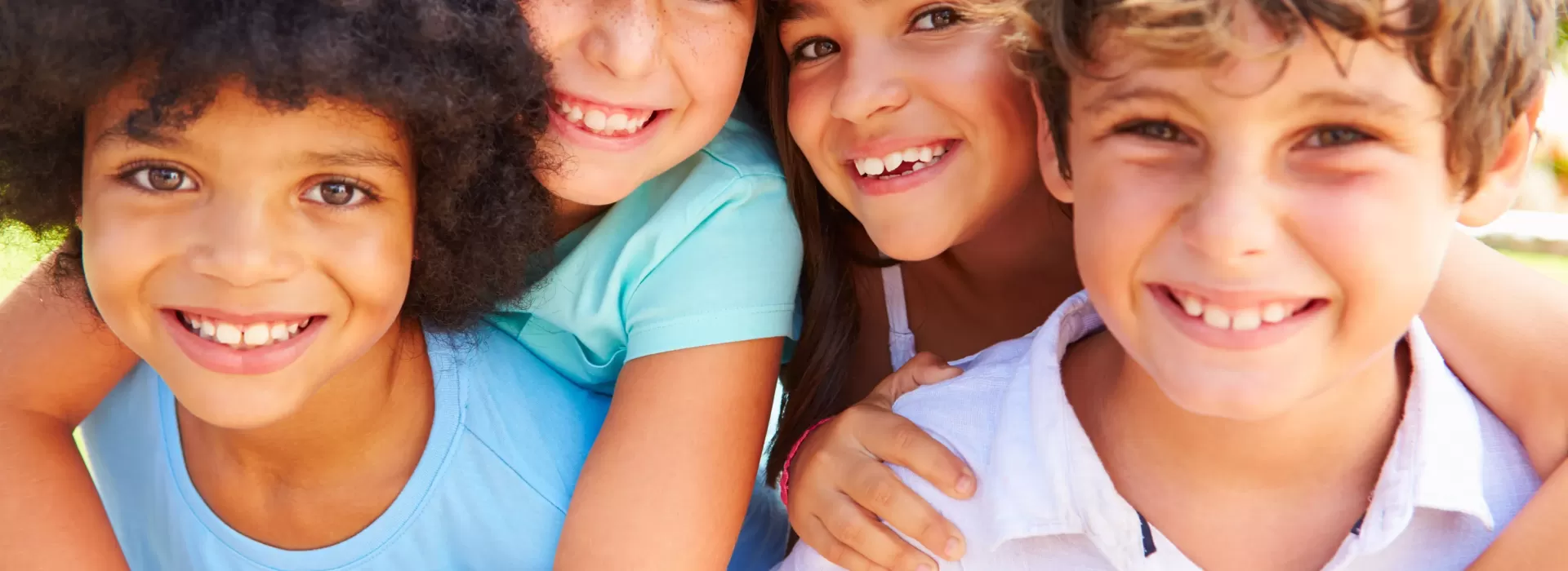a group of children smiling