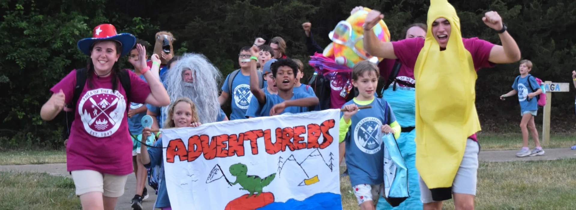 Staff bringing Adventurer group to campfire